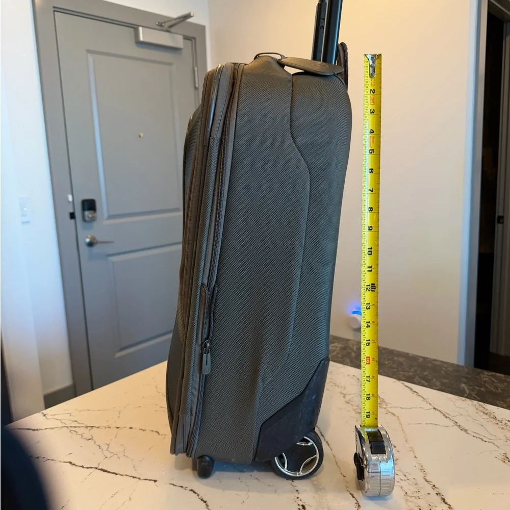 Tumi Brown Backpack with Multiple Compartments